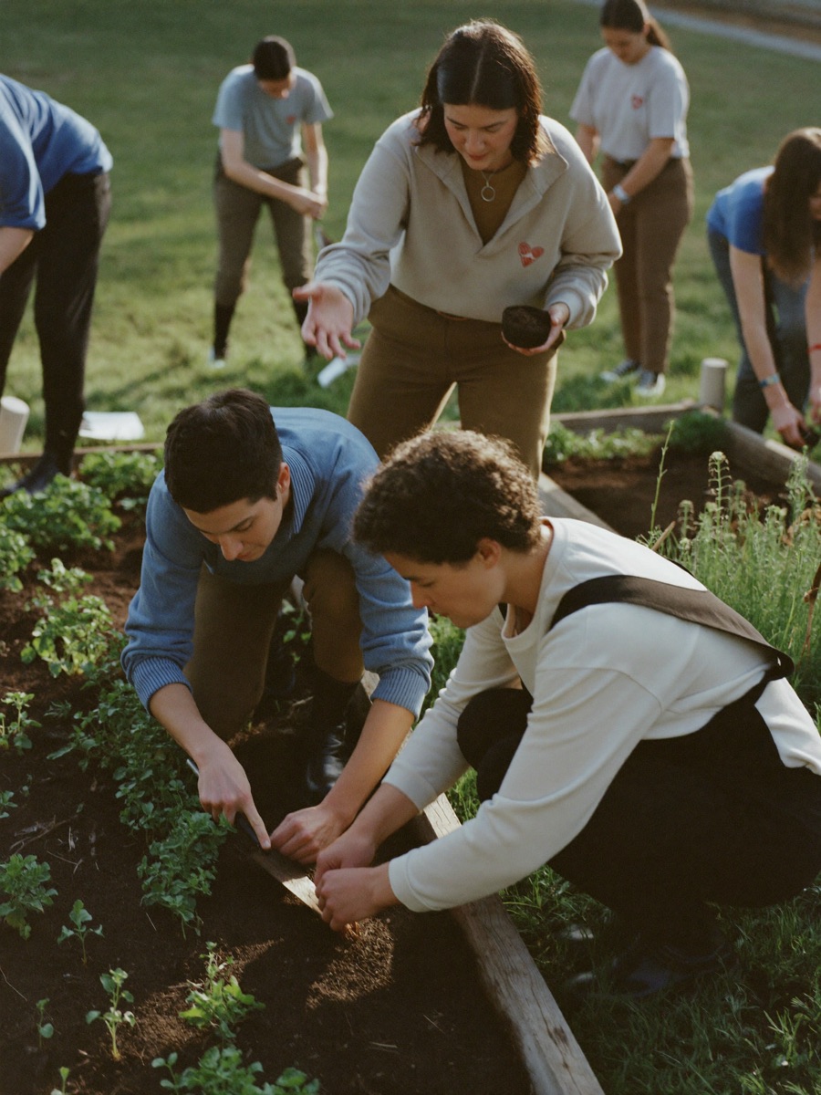 Volunteers planting at a community garden